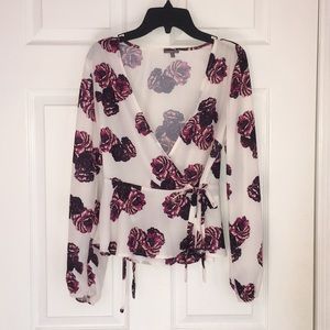 White and purple floral peplum wrap top